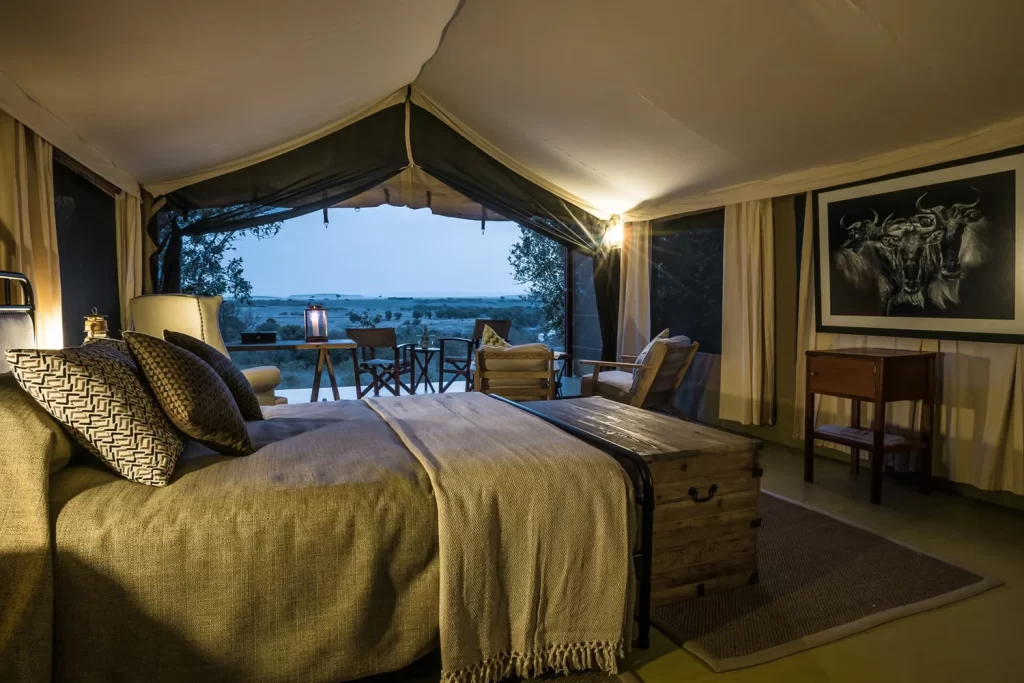 a bed at entim mara camp kenya